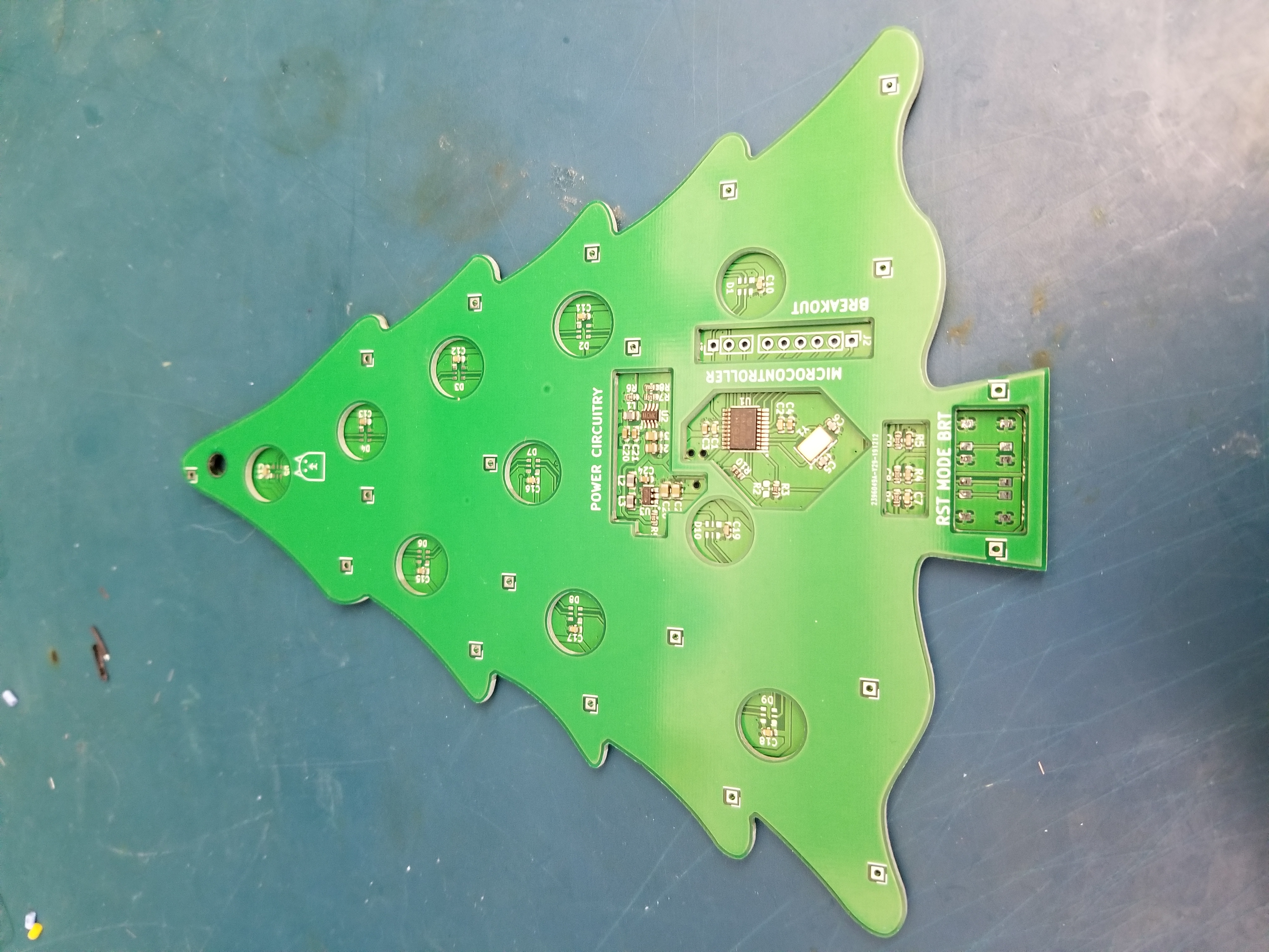 base PCB with cutout layer stacked on top